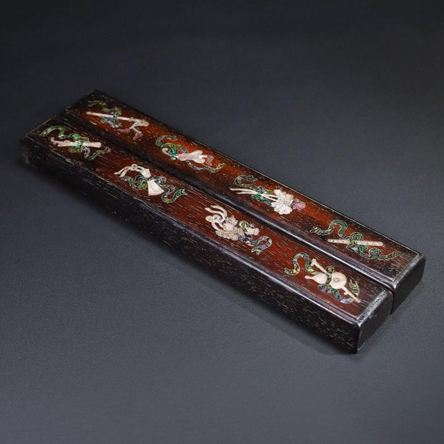 This is an exquisite pair of long, rectangular wooden paperweights (or rulers), featuring intricate mother-of-pearl...