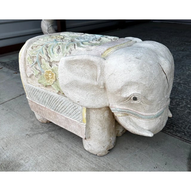 Vintage Hand Carved Elephant Wooden Stool in pastel colors. Solid wood and heavy. Great on a patio or indoors. I would...