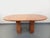 Vintage oval dining table from the 1970s/80s, in Rosso Alicante pink marble with salmon-pink tones and white veining, oval...