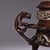 A finely made Chinese incense burner in solid copper with a silver wash, preserved in excellent condition. A pair of...