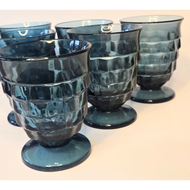 The vivid aquamarine of these honeycomb designed glasses are sheer perfection. Are they footed goblets, tumblers or even...