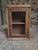 This antique French wall cabinet, dating from circa 1850–1900, is made from solid pine and oak. It features a glazed door...