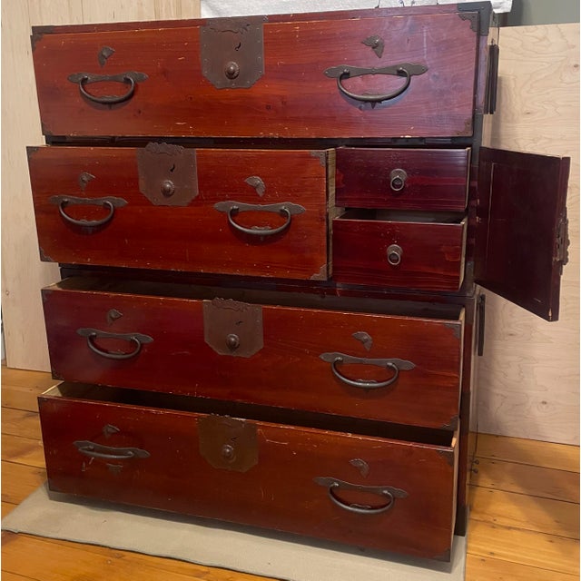 This fine two-piece Chest is an Antique Japanese Isho Tansu (clothing/kimono chest), traditionally dating from the late...