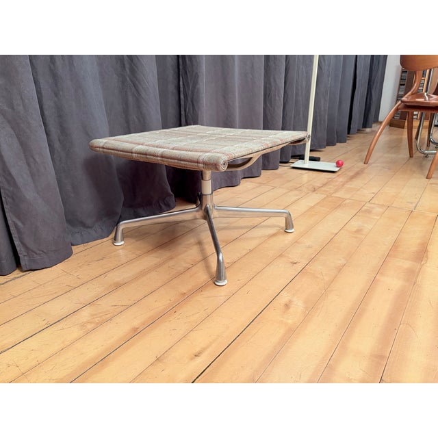 The EA 125 living room ottoman, designed by Charles & Ray Eames for Vitra in 2008, is in very good original condition....