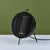 Portable space heater by Wesix. The heater features a round bulbous shape with minimalist curved screen and the original...