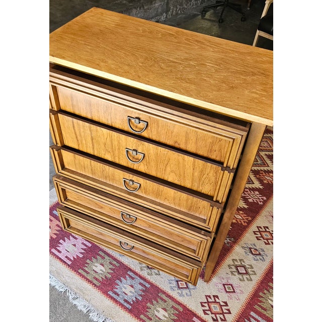 Beautiful MCM vintage Dixie Furniture tallboy/highboy dresser. Featuring classic Mid-Century Modern lines, striking framed...