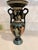 This is a handmade Greek amphora vase, produced in Greece, featuring hand-painted scenes from mythology. The vessel...