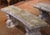 French Pair of Early 20th Century French Weathered Curved Cast Stone Garden Benches For Sale - Image 3 of 9