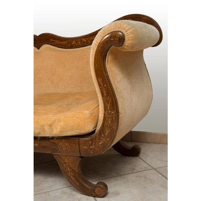 Ancient sofa Carlo X French in precious exotic wood with grafts of maple inlay with a leafy motif. The backrest has an...