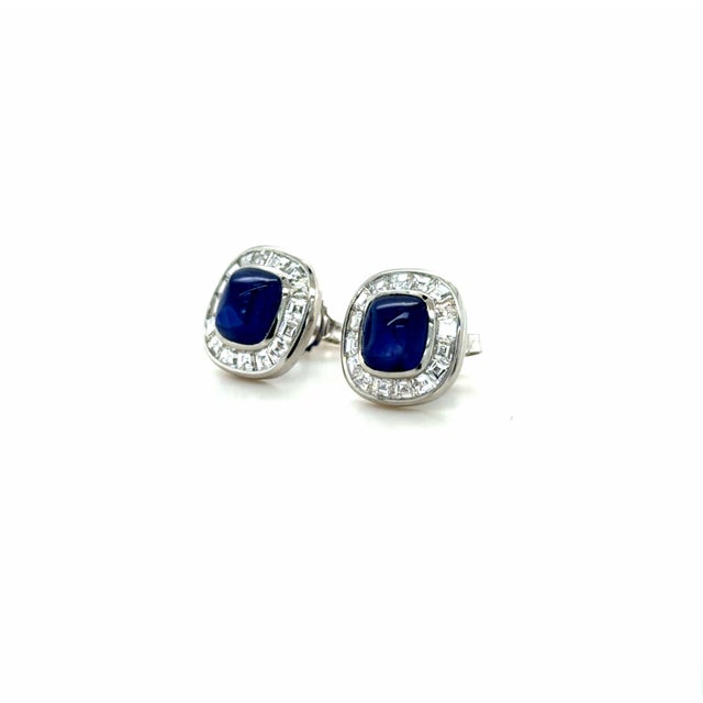 Two AGL certified sugarloaf Ceylon Sapphires measuring 7.00 x 6.30 x 4.37 mm and 6.80 x 6.10 x 4.21 mm and weighing...