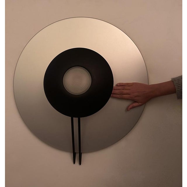 Large aluminum wall lamp, prismatic shortbread glass and black lacquered metal. Italian post-modernist current from the...