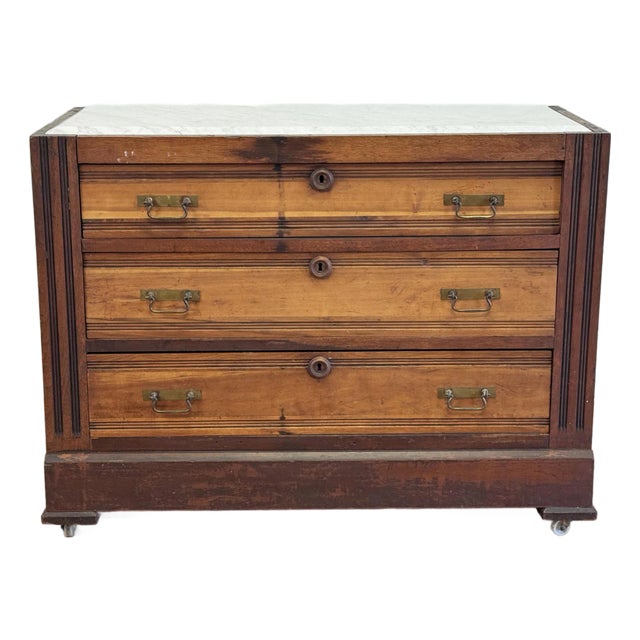 Antique Beveled Marble Top Wood Three Drawer Eastlake Commode For Sale