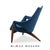 A mid century modern walnut three legged lounge chair by Luigi Tiengo. Professionally refinished. New blue velvet...