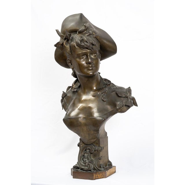 Description: An antique sculpture of Napoleon III in patinated bronze depicting an allegory of beauty, signed "A.NELSON,"...