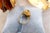 Gold ring with oval-shaped table, diamond flakes and cut iolite. Metal: Gold. Origin: Portuguese. Brand: Dragão. Weight:...