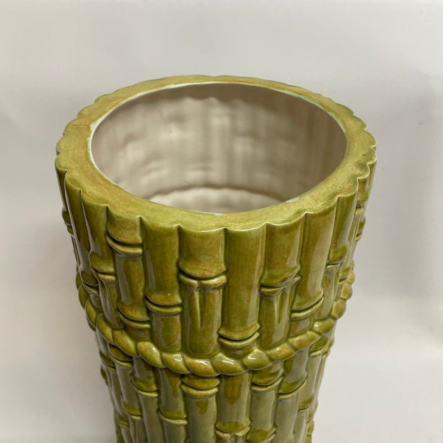 Beautiful Vintage Faux Bamboo Ceramic Umbrella Stand. Crafted with from ceramic, carved in a bamboo-like form with a...