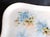 This is a signed MZ Austria floral vanity tray in blue. The tray is pale blue and/or green with blue flowers. It is signed...