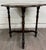 This is a gorgeous vintage Jacobean Revival oak side table with a beautifully scalloped top, turned legs, and decorative...
