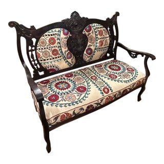 Antique Victorian Style Carved Mahogany Loveseat With Suzani Textile Upholstery For Sale