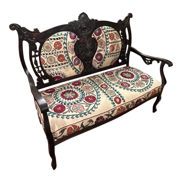 Antique Victorian Style Carved Mahogany Loveseat With Suzani Textile Upholstery For Sale