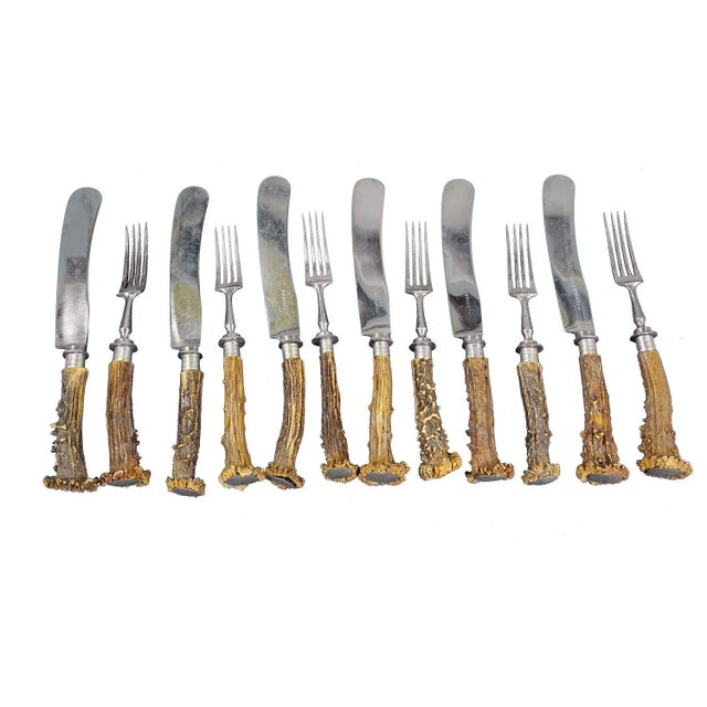 Vintage Stainless Steel and Horn Tableware Set for 6 Germany, 1900s A rustic tabelware set consisting of six knives and...