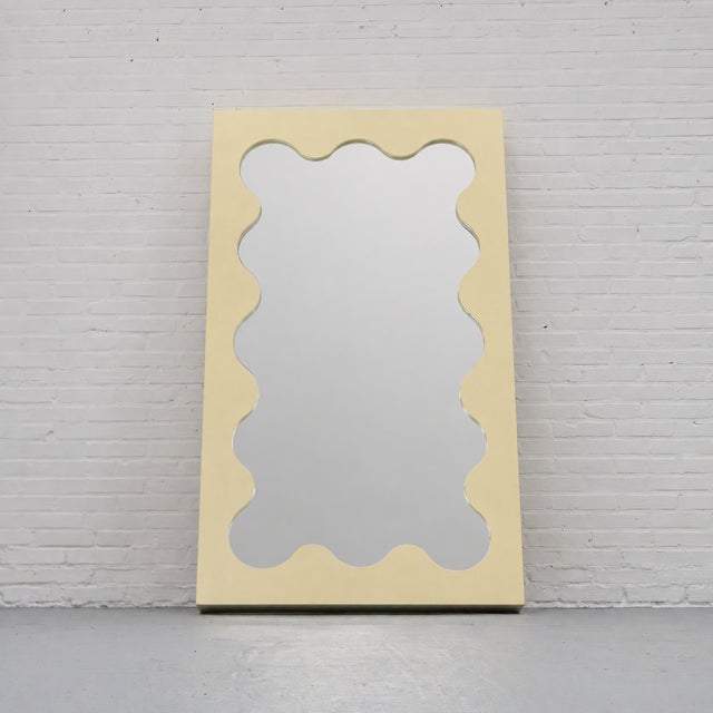 Contemporary Gustaf Westman Curvy Mirror, handcrafted in Sweden and defined by his recognisable wavy frame. The wooden...