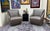 A pair of very clean contemporary Nikki leather swivel chairs by W. Schillig. The chair swivels 360 degrees and rests on...