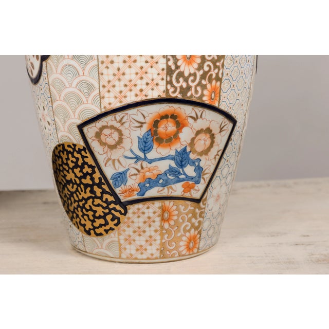 Arita Japanese Style Lidded Jars with Gold, Blue and Orange Floral Motifs - A Pair For Sale - Image 10 of 12