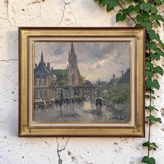 A rain washed afternoon brings poetic beauty to “Place de la Carrière, Nancy,” an evocative oil on canvas by José...