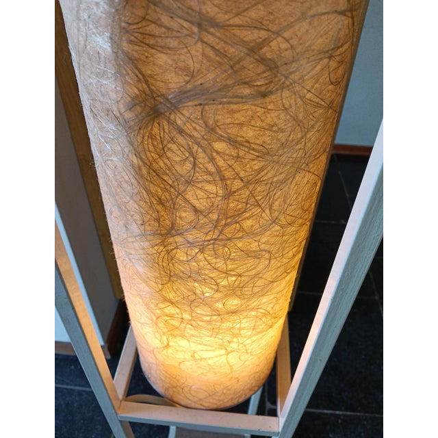 Nicely design.cubist glass fiber floorlamp. Remains in its original conditions. The lamp is lit by a single light bulb. It...