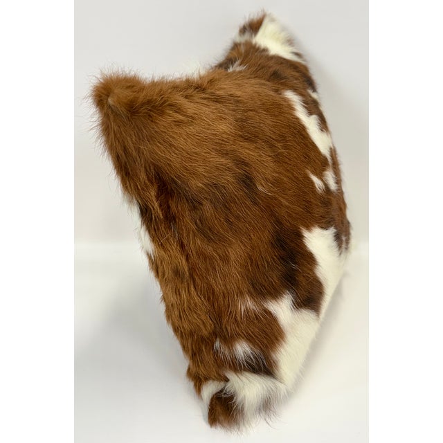 Striking and richly textured, this 18” x 18” pillow cover is crafted from genuine long-haired premium Colombian cowhide in...