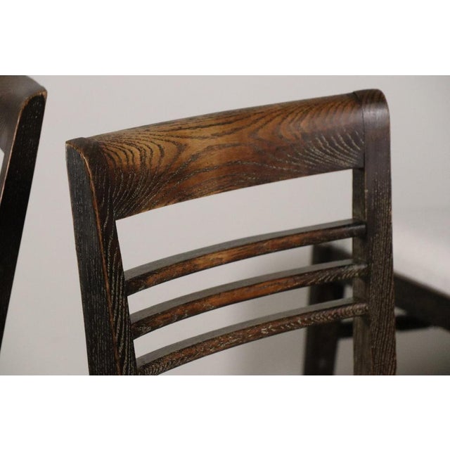 Set of four modernist-style chairs from the 1940s. A solid oak frame. The seat has been fully restored with foam padding...