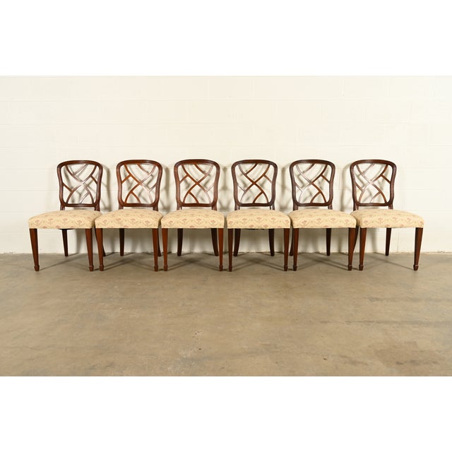 A gorgeous set of six Federal or Hepplewhite style dining chairs In the manner of Kindel Furniture USA, Circa 1980s Carved...