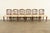 A gorgeous set of six Federal or Hepplewhite style dining chairs In the manner of Kindel Furniture USA, Circa 1980s Carved...