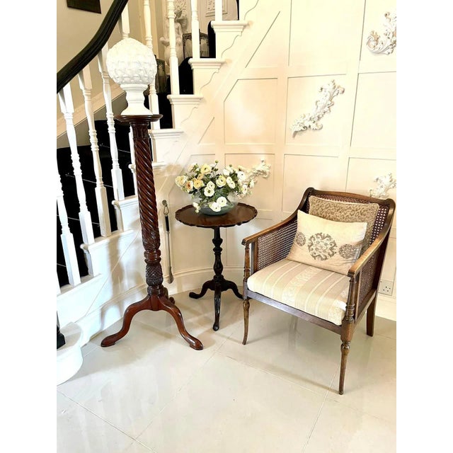 Outstanding quality antique edwardian carved mahogany lamp table having a quality mahogany shaped tilting top with a...