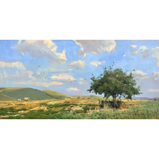 Harmony by Stephanie Hartshorn | Oil on wood panel Landscape with tree and hay bales under blue sky For Sale
