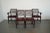 Elegant set of four Federal Revival dining chairs, including two armchairs and two side chairs, crafted in the early to...