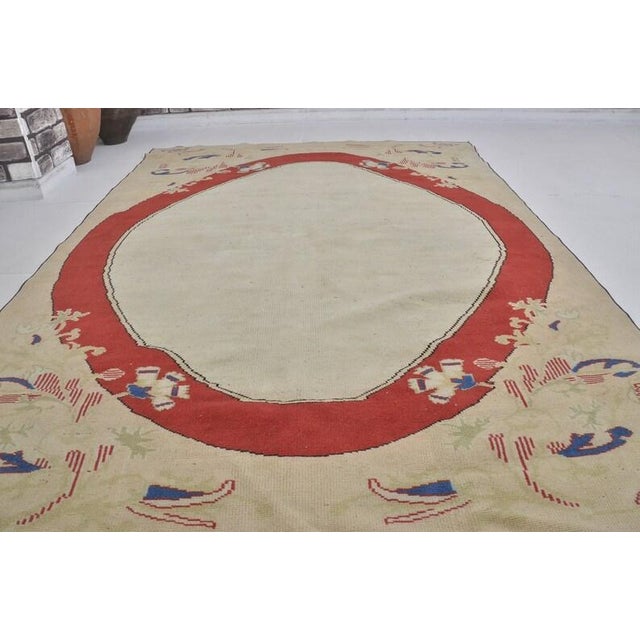 Vintage Turkish Oushak Area Rug With Bold Red Oval Medallion and Cream Field For Sale - Image 9 of 10