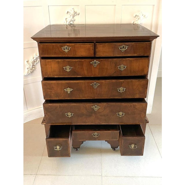 Antique william & mary quality figured walnut chest on stand having a quality figured walnut polished rectangular shaped...