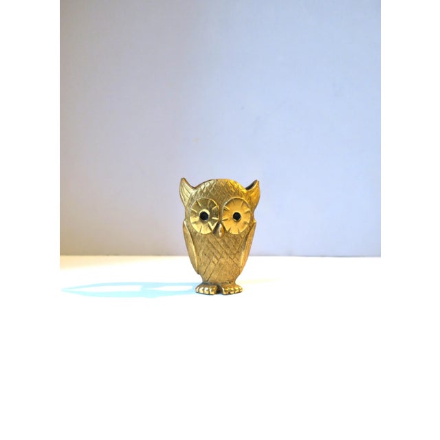 A beautiful and substantial gold gilt bronze owl bird eyeglass holder, circa 1960s. Piece is beautifully detailed as...