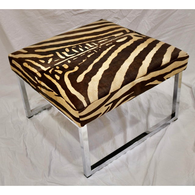 Cow Hide in Zebra Pattern Upholstered Bench Stool With Chrome Legs.