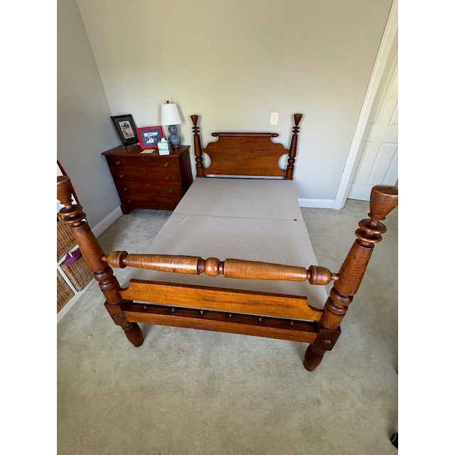Antique Rope Bed, mid 19th century solid Tiger maple wood rope bed. It is 7 feet long, 51 inches wide, and 48.5 inches...