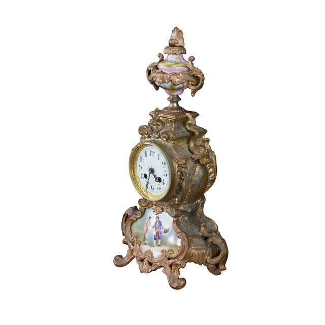 Dating from the early 20th century, this magnificent French Rococo-style mantle clock seamlessly balances striking antique...