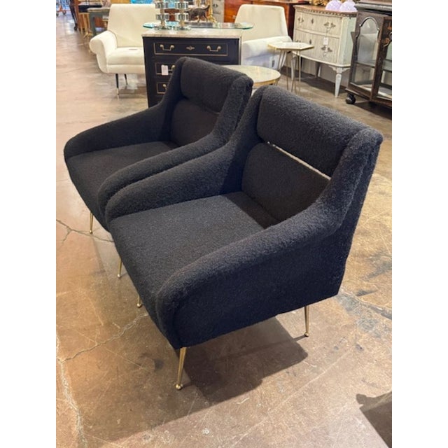These black mohair mid-century modern Gigi Radice design lounge chairs are perfect for to adding a touch of sophistication...