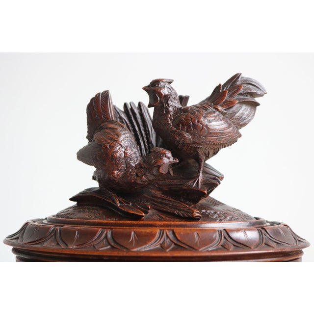 This exceptional 19th-century Black Forest jewelry box from Switzerland is a true work of art, featuring a rare oval...