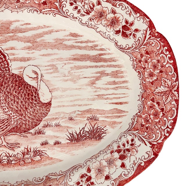 This classic vintage turkey platter is a beautiful example of red and white transferware. Measuring an impressive 20...