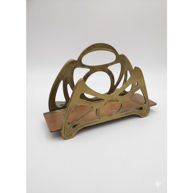Stunning Art Nouveau/Art Deco brass letter holder featuring an elegant pierced design with flowing organic motifs. This...