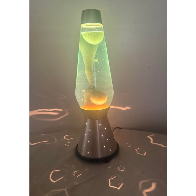 This rare vintage Lava Simplex lava-lite lamp comes in its original box, making it a highly sought-after collectible for...