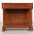 A French 19th century mahogany console in the Empire style with marble top. The gray, Saint Anne-type marble is in...