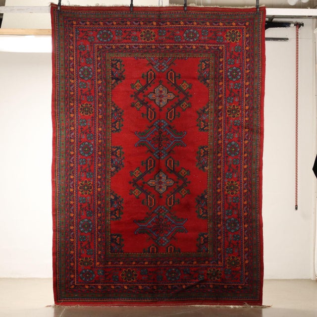 Ushak wool carpet, large knot, manual production. This piece is attributed to the mentioned designer/maker. It has no...